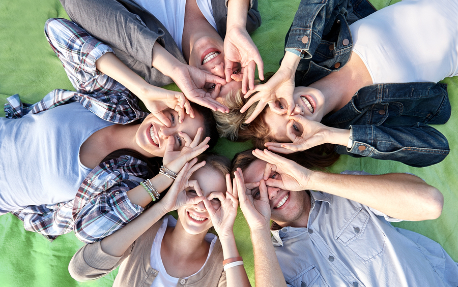 College scholarship students hanging out outside